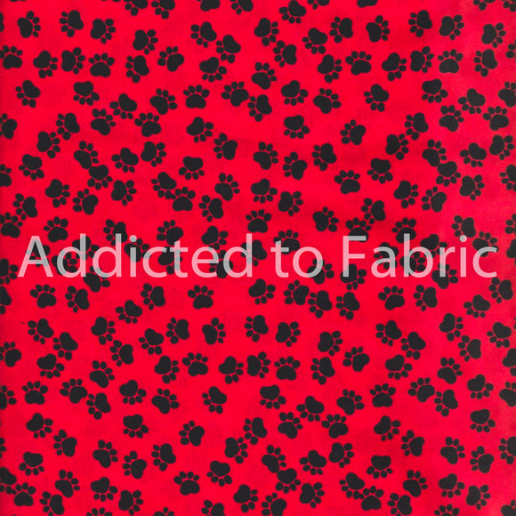 Black Paw Prints on Red Fabric by Hi-Fashion Fabrics,, Puppy Paws